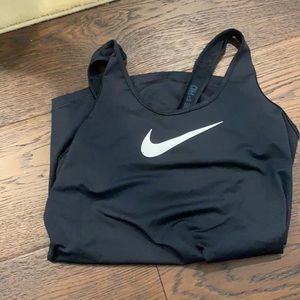Nike tank top in black womans size Medium